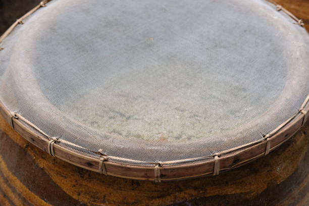 istock salted soybean paste in jar. soy miso production 1128681940