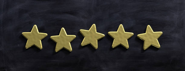istock Five golden stars isolated on blackboard, banner. 3d illustration 1128682139