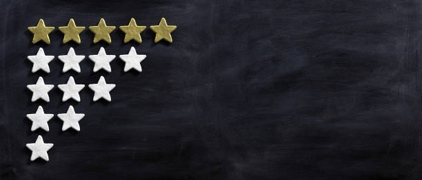 istock Five golden stars isolated on black background, 3d illustration 1128682141