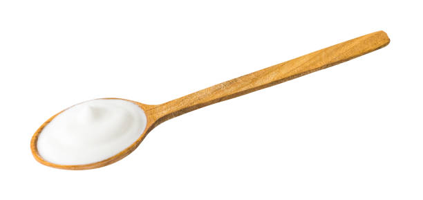 istock Yogurt on Wooden Spoon 1128683418