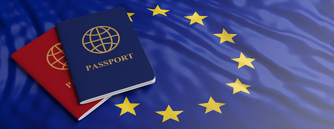 Travelling to EU, immigration or tourism. Two passports on European Union flag background, banner, copy space. 3d illustration