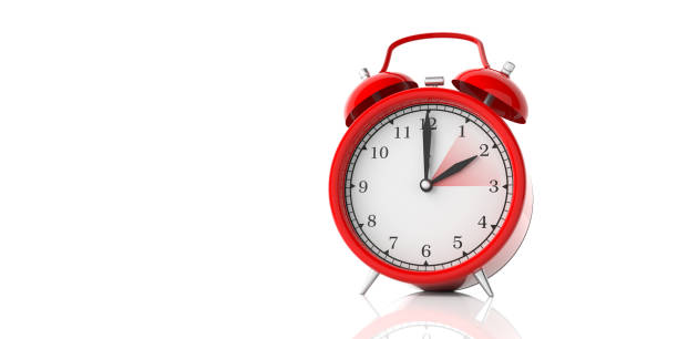 istock European daylight saving time end. Red alarm clock isolated on white background, copy space. 3d illustration 1128684822