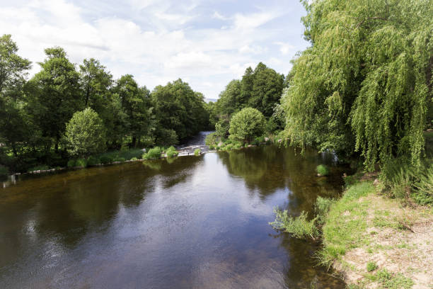 water running slow and calm down a river