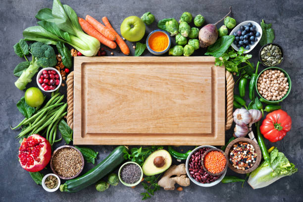 selezione di cibi sani con frutta, verdura, semi, super alimenti, cereali - nut bean legume seed foto e immagini stock