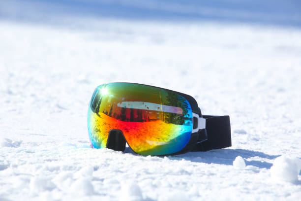 istock Ski and snowboard mask in snow 1128687507