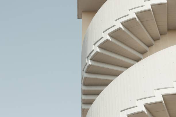 istock Spiral staircase of a building - Minimal perspective (Pesaro, Italy) 1128689614