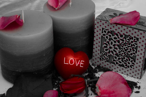 istock Love heart valentine roses candles 1128690655