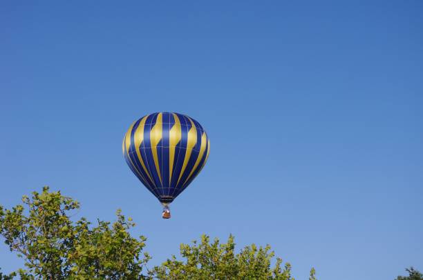 istock The blue and yellow hot air balloon 1128693054