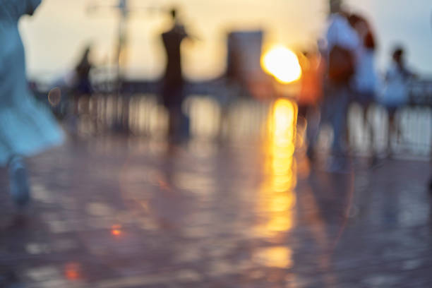istock city people abstract background blur action sunset 1128694595