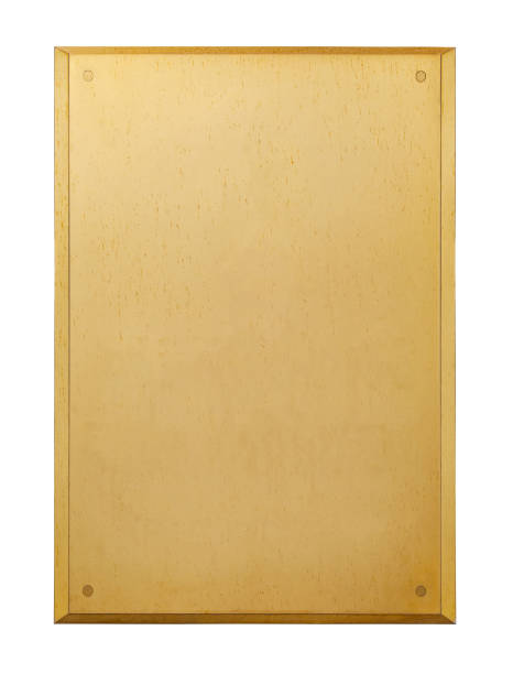 Vertical gilded metal plaque with rivets, isolated on a white background