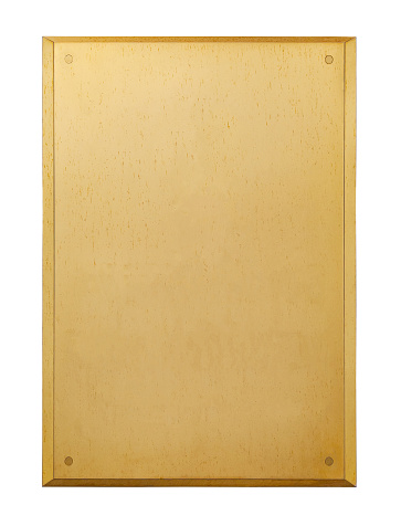 Vertical gilded metal plaque with rivets, isolated on a white background (design element, clipping path)