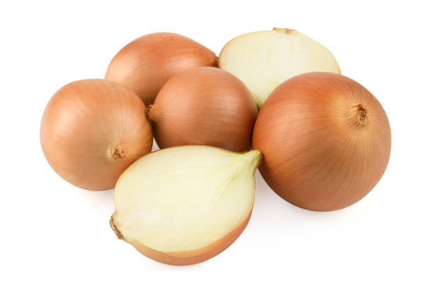 istock heap of fresh beige onion bulb isolated on white background 1128698740