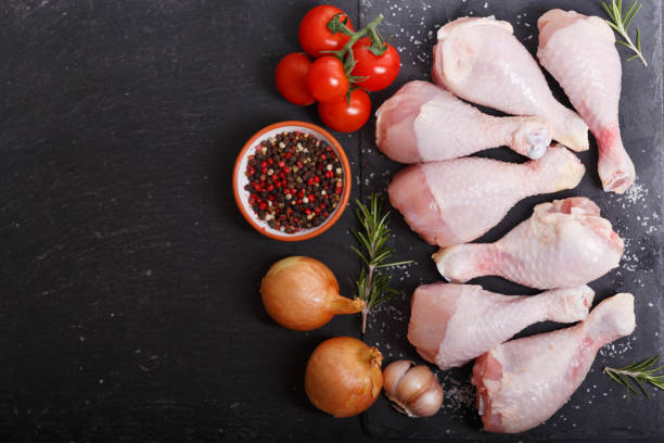 istock fresh chicken meat with ingredients for cooking, top view 1128699089