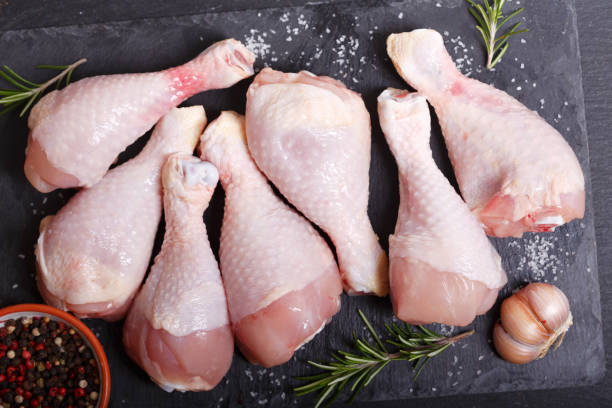 istock fresh chicken meat with ingredients for cooking, top view 1128699092