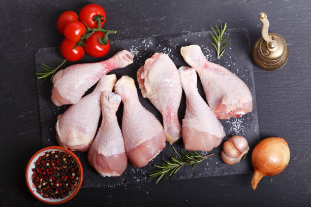 istock fresh chicken meat with ingredients for cooking, top view 1128699093
