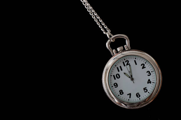 istock Pendant watch with the time 11 o'clock 1128702268