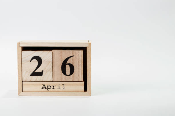 istock Wooden calendar April 26 on a white background 1128705025
