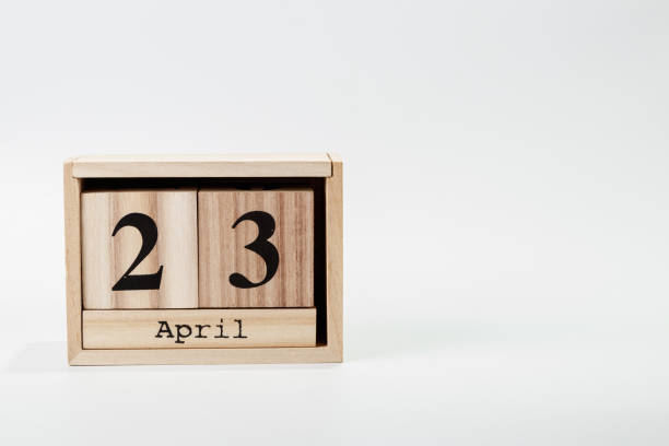 istock Wooden calendar April 23 on a white background 1128705107