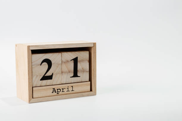 istock Wooden calendar April 21 on a white background 1128705526