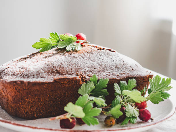 istock Chocolate cake, fresh berries and vintage plate 1128706193