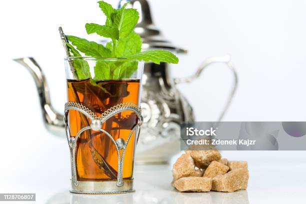 Traditional Arabic Mint Tea In The Typical Glass Stock Photo - Download Image Now - Tea - Hot Drink, Arab Culture, Arabic Style