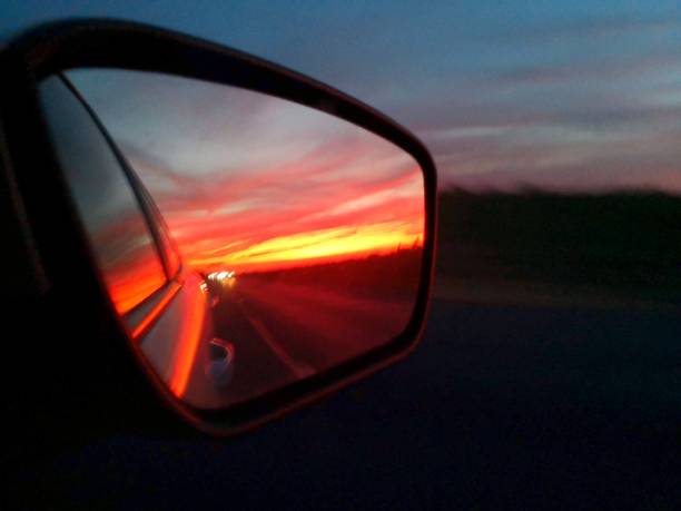 istock Idilyc sunset on the car mirror 1128708793