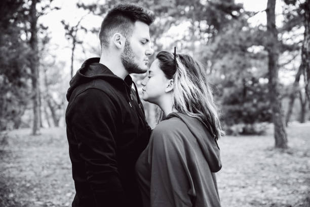 istock Kissing his girlfriends head 1128708961