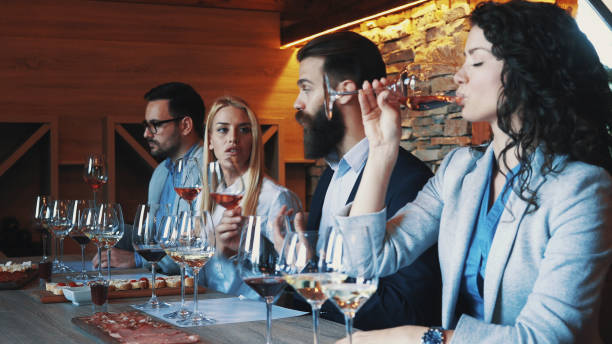 istock Friends tasting wine together 1128709288