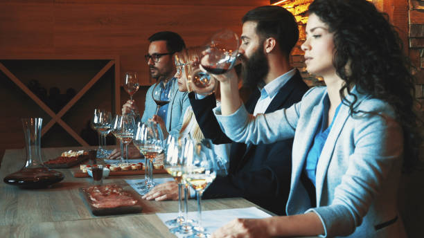istock Friends tasting wine together 1128709338