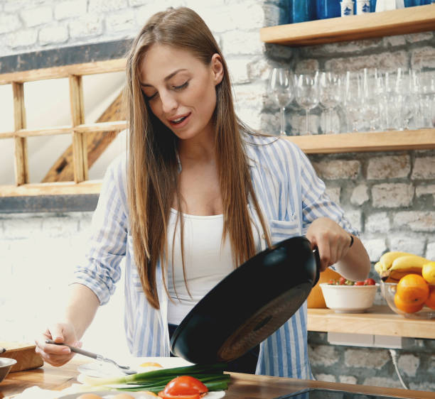 istock young girl at kitchen 1128709370