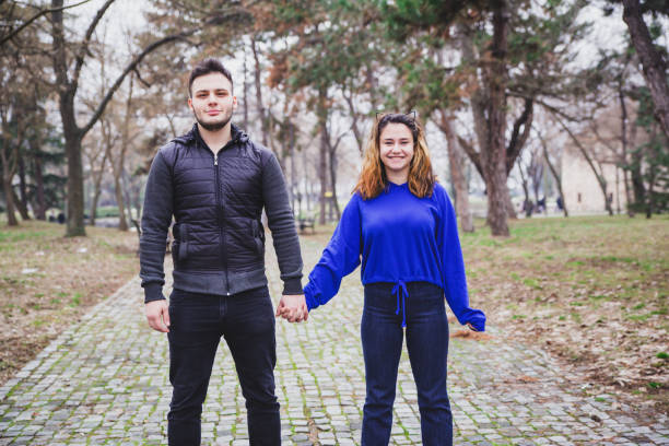 Couple walking in park