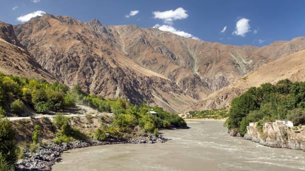 istock Panj or Amu Darya river and Pamir mountains Tajikistan 1128711036