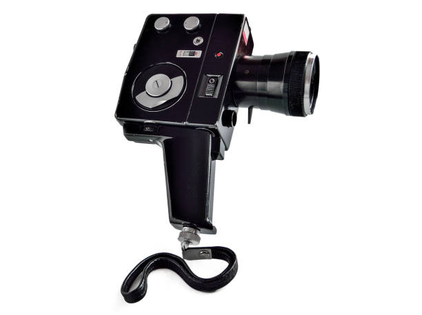 istock Vintage movie camera isolated on white background 1128711362