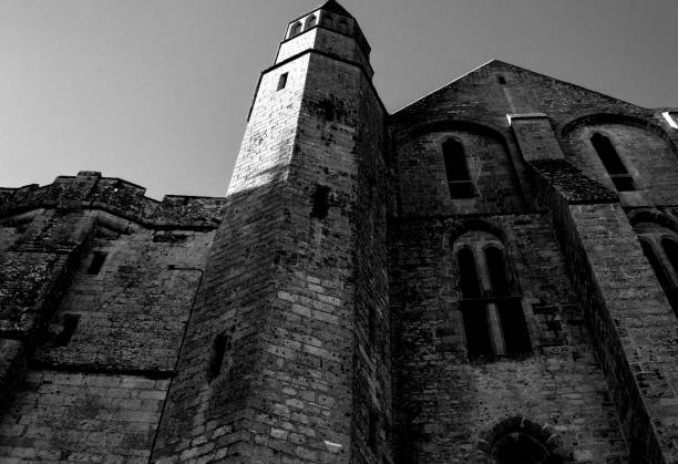 Black and white image of the vaults of an old medieval abbey.
