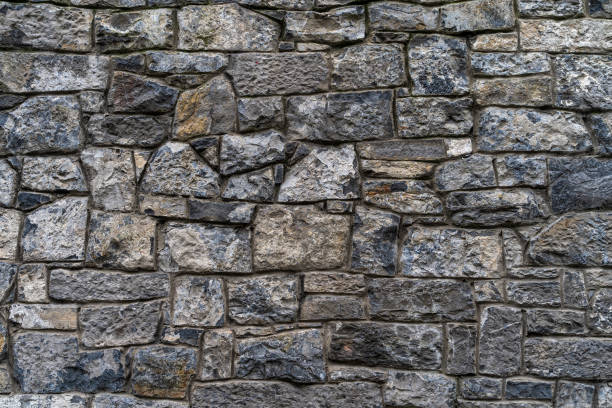 grungy gran muro de piedra - textura de alta calidad / antecedentes - pared de piedra fotografías e imágenes de stock