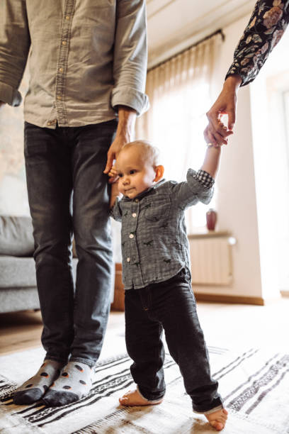 istock teaching how to walk to the son 1128723272