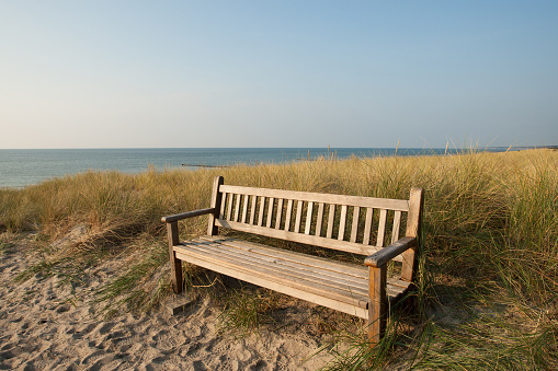 wooden bench  with view on sea, and horizon