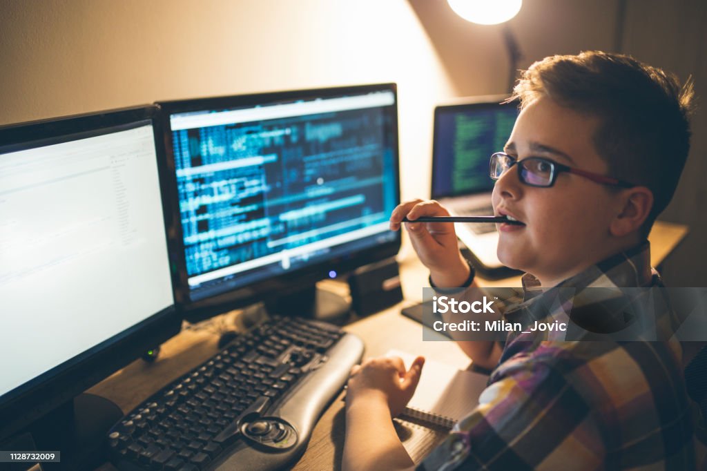 Boy Learning Programming At Home Stock Photo - Download Image Now - 8-9 ...