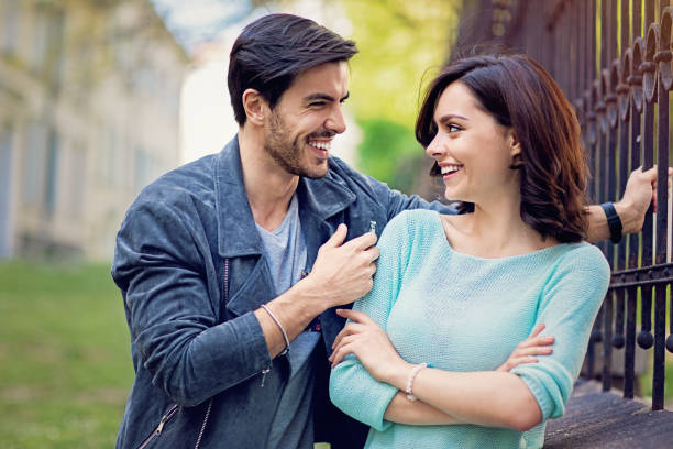 istock Happy, young couple is making fun and showing their love 1128732803