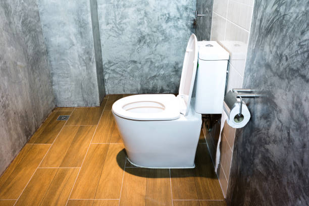 istock White toilet bowl in a bathroom style loft 1128733295