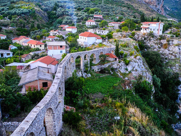 istock Old aqueduct in Bar, Montenegro. Beautiful evening landscape. 1128734370