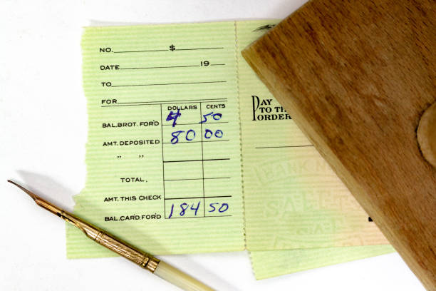 istock Vintage Check Stub with Pen, Deposit Recorded 1128739026