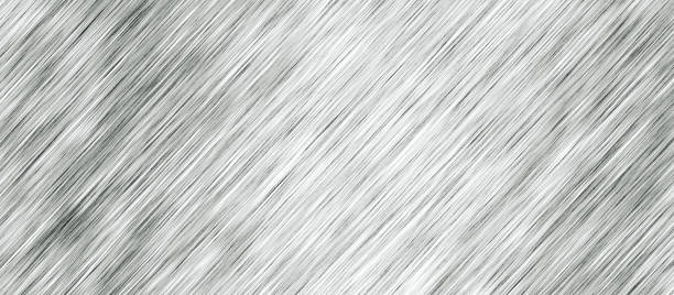 istock Long and wide background in horizontal position.Abstract brushed diagonally line light gray metal surface. 1128740297