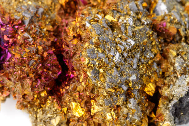 istock Macro mineral stone  Chalcopyrite on a white background 1128745914