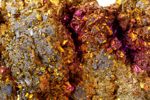istock Macro mineral stone  Chalcopyrite on a white background 1128746012