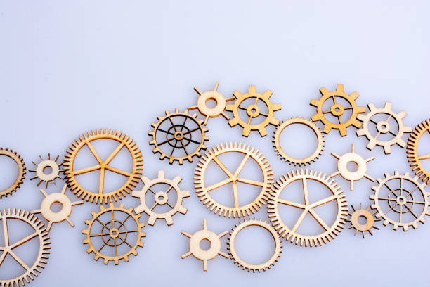 istock Gear wheels on white background as concept of engineering 1128746038