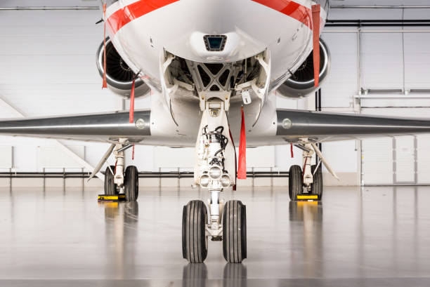 istock Business Jets in Hangar 1128747045