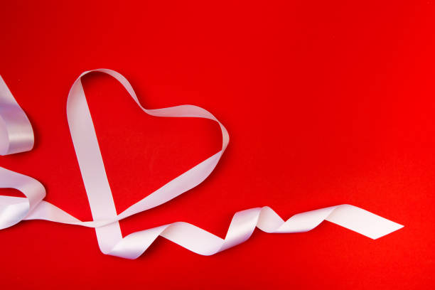 istock whiteheart ribbon and Happy valentine's day 1128747507