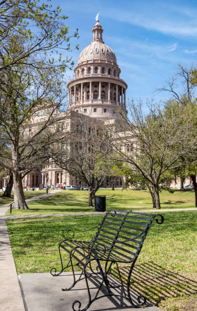 istock Texas Capitol Building and Park Bench 1128748729