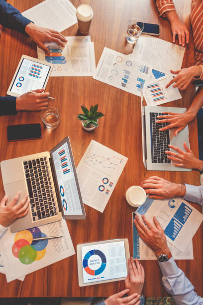 istock Group of people meeting with technology. 1128748776